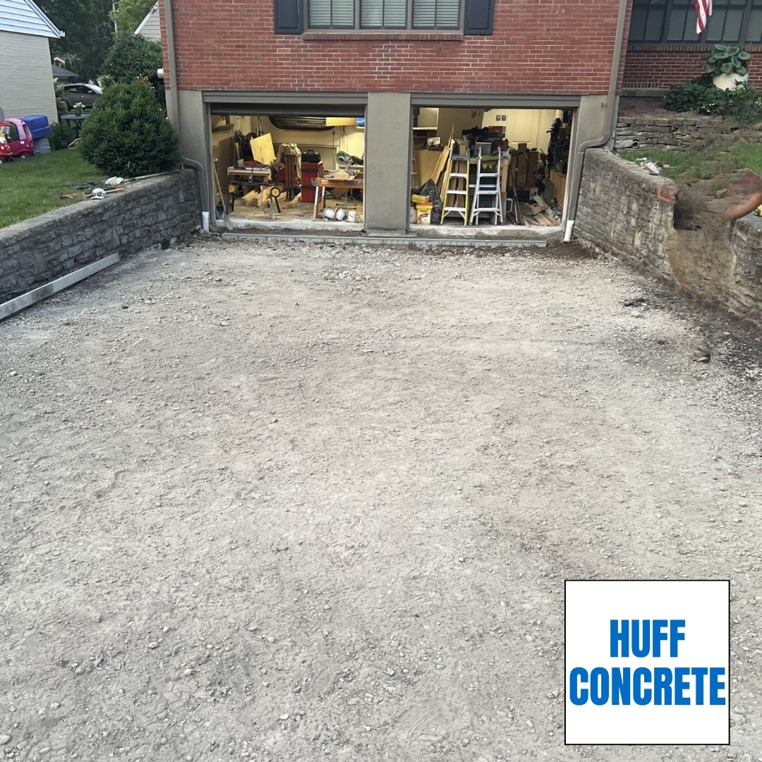 Asphalt driveway removal on Shewango Way in Madeira Ohio before concrete replacement