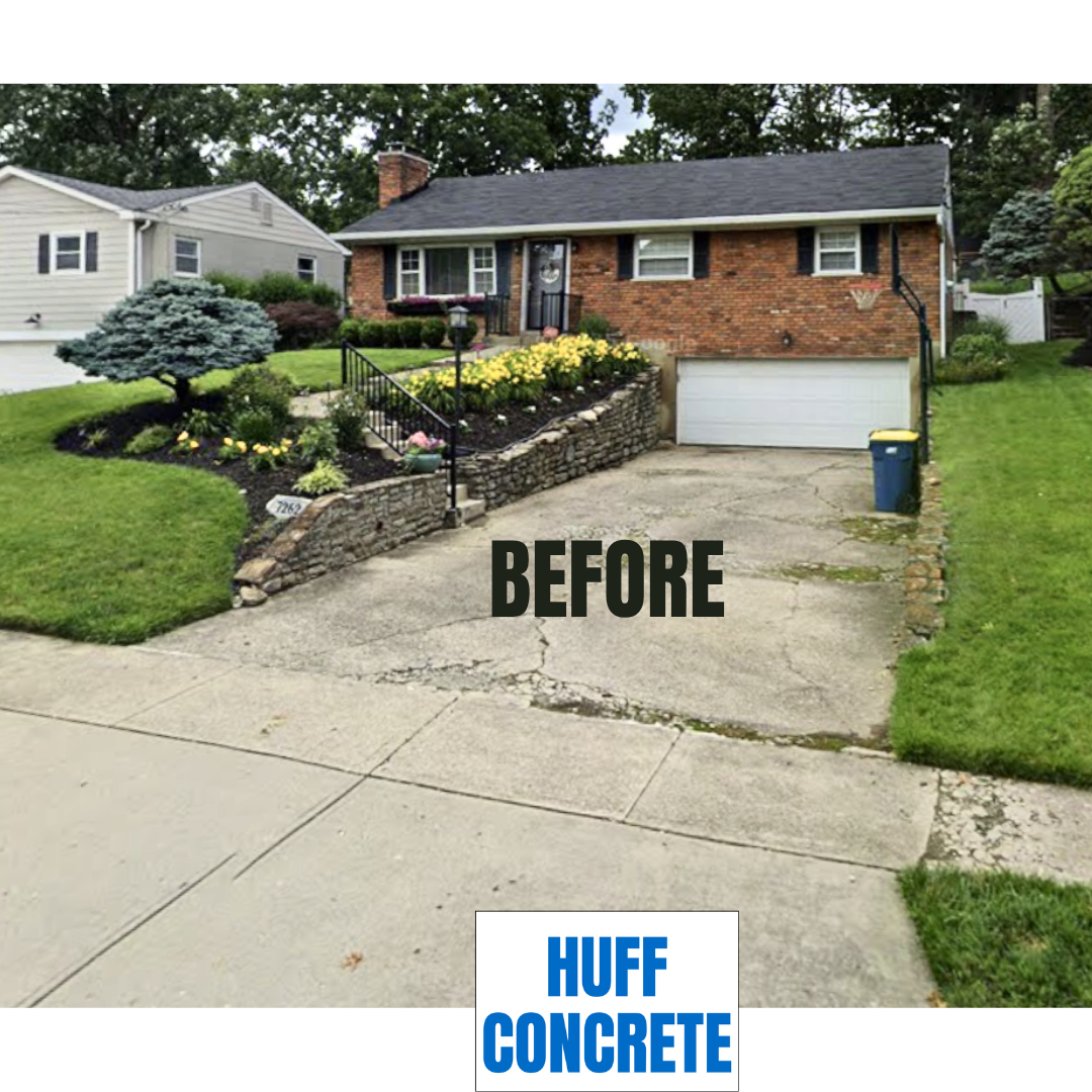 Cracked concrete driveway and crumbling retaining wall with weeds at Madeira Ohio home before concrete driveway replacement