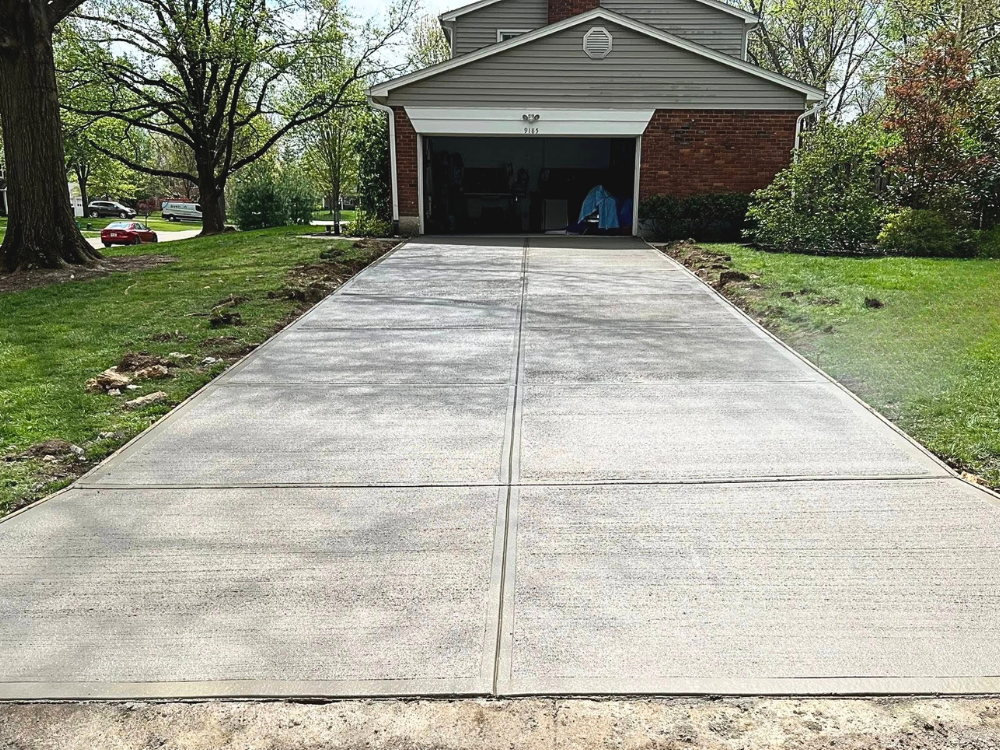 two-card concrete driveway with apron