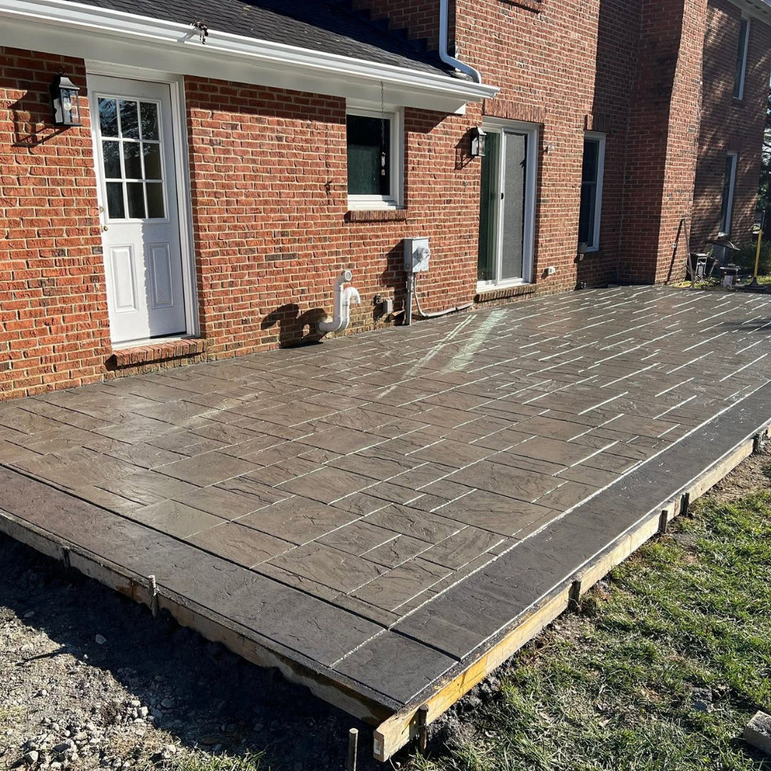 patio featuring stamped concrete with a unique stamped border