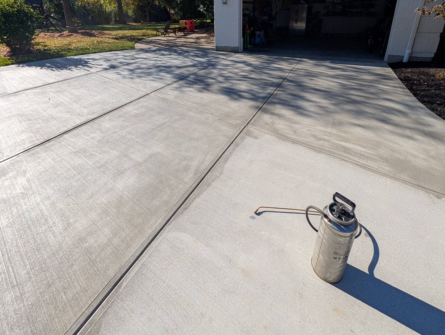 Huff Concrete can power wash and seal your concrete driveway, patio, or stamped concrete to protect it from salt, ice, and more